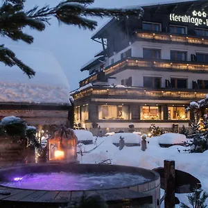 Chalet-hotel Hermitage Hotell